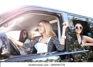 Happy Friends Together In Car On Road Trip