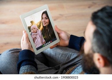 Happy Friends In Video Call On Tablet - Mom With Little Baby Girl At The Park Meet Father Online With Remote Smartphone Webcam - Brother Hangout With Sister And Granddaughter