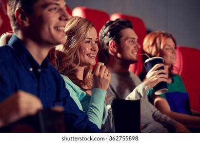 Happy Friends Watching Movie In Theater