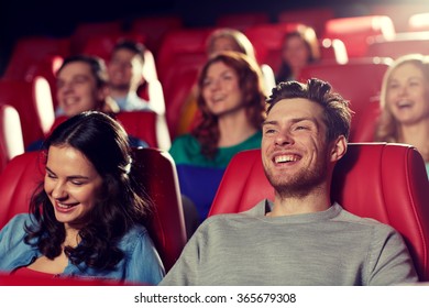 Happy Friends Watching Movie In Theater