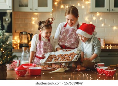 happy funny family mother and children  bake christmas cookies
 - Powered by Shutterstock