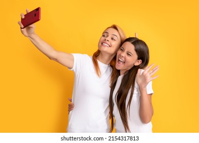 Happy Funny Family Of Mother Woman And Child Girl Making Selfie On Smartphone, Live Streaming