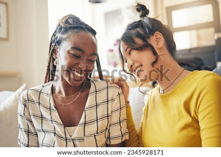 Happy, funny and friends gossip, speaking and bond with joke, humor and story in their home. Smile, laugh and women with diversity in a living room share drama, chat and silly, talk and enjoy weekend