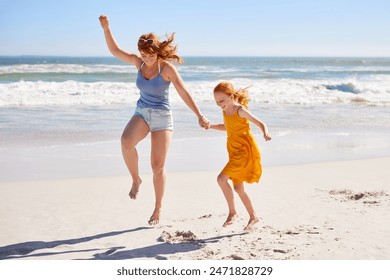 Happy funny mom with daughter jumping on summer beach with copy space. Cheerful mother dancing along seaside with cute little girl with red hair. Happy older sister having fun with kid at ocean shore. - Powered by Shutterstock