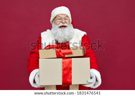 Similar – Image, Stock Photo Many hats of Santa on a rustic wooden table