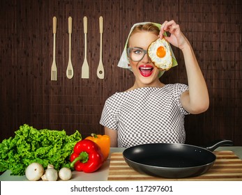 Happy Funny Woman Cook Holding Pan With Fried Egg - Close Up