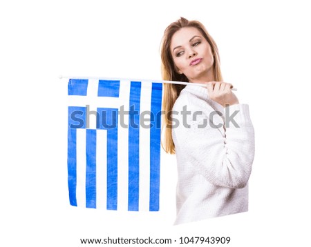 Happy funny woman holding Greece greek national flag being patriotic loving her country.