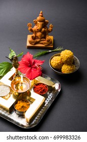 Happy Ganesh Chaturthi Greeting Card Showing Photograph Of Lord Ganesha Idol With Pooja Or Puja Thali, Bundi Laddu/modak, Durva And Hibiscus Or Jasvand Flower
