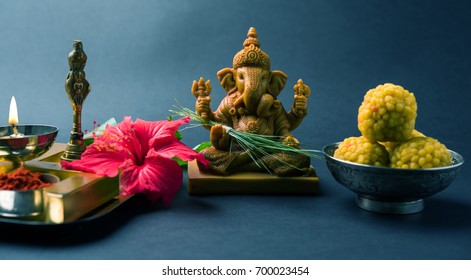 Happy Ganesh Chaturthi Greeting Card Showing Photograph Of Lord Ganesha Idol With Pooja Or Puja Thali, Bundi Laddu/modak, Durva And Hibiscus Or Jasvand Flower
