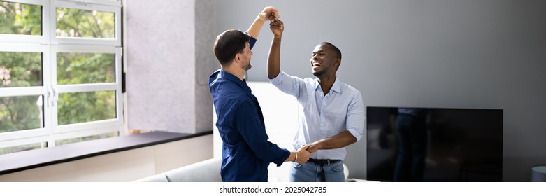 Happy Gay Couple Dancing. Romantic Dating At Home