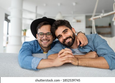 Happy Gay Couple Embraced, Joking And Having Fun In An Intimate Hug