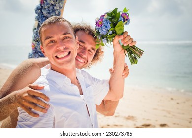 Happy Gay Couple Near The Beach