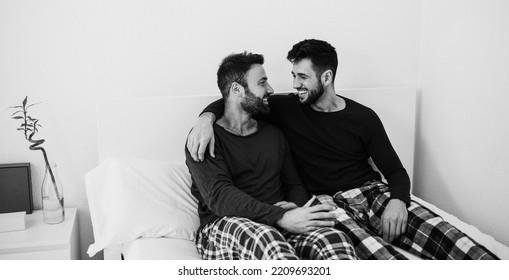 Happy Gay Men Couple Having Tender Moments At Home - Focus On Right Man Face - Black And White Editing