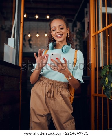 Happy gen z young woman with smartphone, social media fashion influencer in trendy cafe and youth culture in Miami. .Trendy student communication, reading text on cell and 5g technology connection