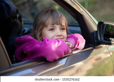 Happy Girl .baby. From A Car Window, Travel Concept.