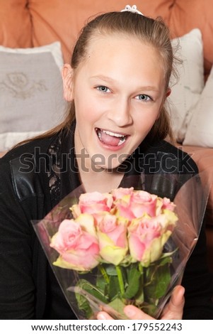 happy girl with bunch of flowers