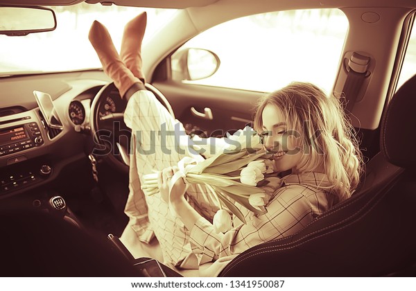 happy girl\
in the car, travel spring mood\
happiness