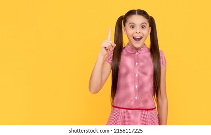 Happy Girl Child Genius Got Idea Pointing Finger Up Yellow Background, Eureka