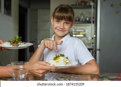 Happy Girl Chose One Dish Out Of Two Offered By Her Mother For Lunch