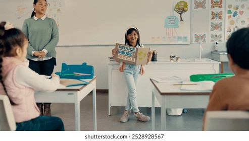 Happy girl, classroom or presentation with poster for recycling, global warming or awareness on waste at school. Young, child or elementary student with sign for lesson on pollution or climate change - Powered by Shutterstock