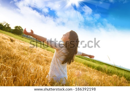 Similar – Image, Stock Photo girl walking in a field with yellow flowers sunny day