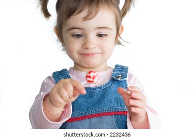 Happy Girl Holding A Candy Lolipop