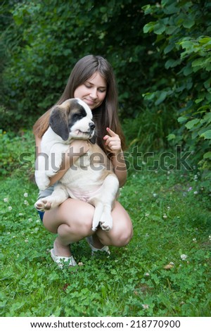 Similar – Foto Bild Frau mit blondem Labrador auf der Lichtung