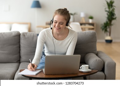 Happy Girl Interpreter In Headset Translate Write Notes Listen Audio Course Study Work On Laptop, Smiling Teen Student Wearing Headphones Learning Online Training Class, Distance Education Concept