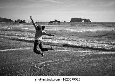 Happy Girl On Northern California Beach.