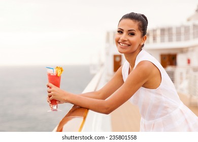 Happy Girl Relaxing On Cruise Drinking Cocktail