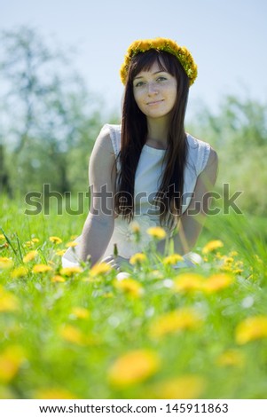 Similar – beautiful young woman smiling while walking in the park