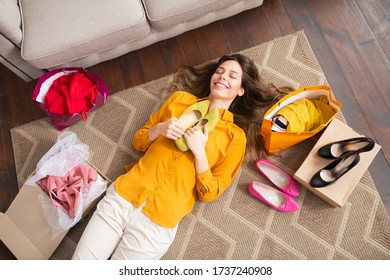 Happy Girl. Smiling Young Girl Holding New Shoes And Feeling Happy