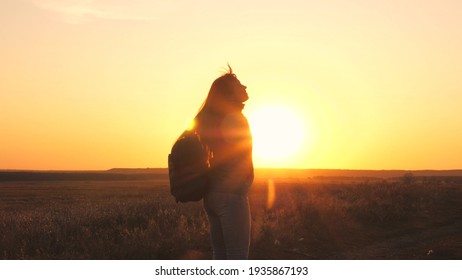 happy girl teen child closed her eyes dream. teenage kid wants a dream come true portrait at sunset. woman daughter silhouette dream of a happy childhood. free face sister closed eyes - Shutterstock ID 1935867193