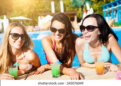 Happy Girls With Beverages On Summer Party Near The Pool