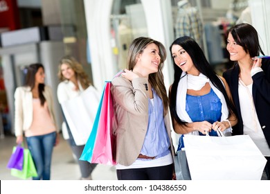 Happy Girls Out Shopping At The Mall