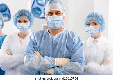 Happy Glancing Team Of Doctors