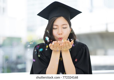 Happy Graduated Student Girl Blowing Multicolor Confetti From Her Hands, Congratulations, Graduate Education Success Concept.