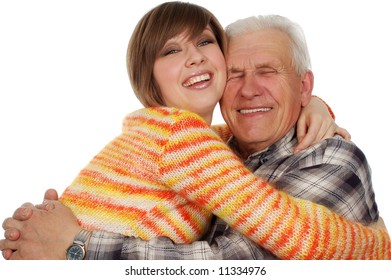 Happy Grandchild Hugs A Happy Grandad. Isolated On White