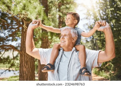 Happy grandfather, child and back ride in forest for journey or family bonding together outdoors. Grandpa smile carrying kid in piggyback for holiday adventure, travel or trip in nature or woods - Powered by Shutterstock