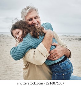 Happy, Grandfather And Child Hug On Beach For Love, Care And Family Bonding In The Outdoors. Grandpa Hugging Grandchild Embracing Relationship In Joyful Happiness For Free Time Together In Nature