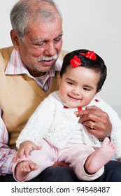 Happy Grandfather With Grand Daughter