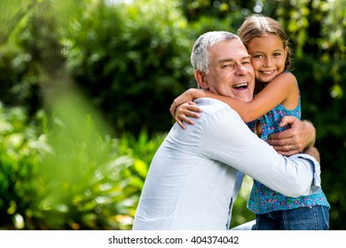 Happy Grandfather Hugging Grandaughter Yard Stock Photo 404374042 ...