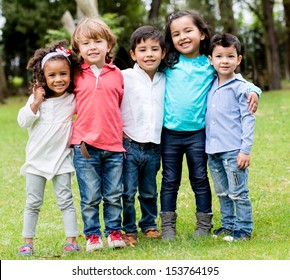 Happy Group Of Children Together At The Park 