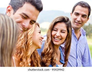 Happy group of friends talking and having fun outdoors - Powered by Shutterstock