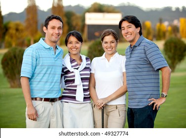 Happy Group Of Golf Players Outdoors And Smiling