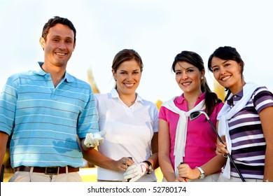 Happy Group Of Golf Players Outdoors And Smiling