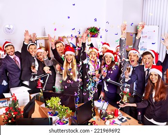 Happy Group People In Santa Hat At Xmas Business  Party.