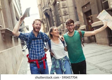 Happy Group Of Students On Sightseeing And Travel Adventure