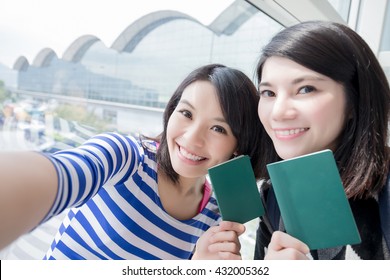 Happy Group Travel Women Hold Passport And Take A Selfie. Shot In Hong Kong, Asian