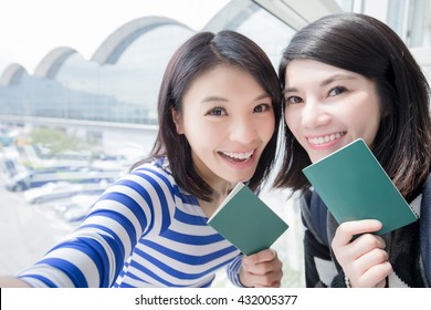 Happy Group Travel Women Hold Passport And Take A Selfie. Shot In Hong Kong, Asian